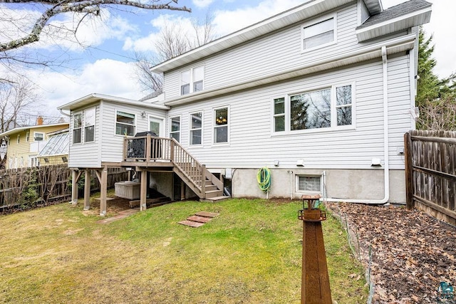 130 W Faribault St, Duluth, MN 55803 - back of house featuring a lawn, a deck, stairway, and a fenced backyard