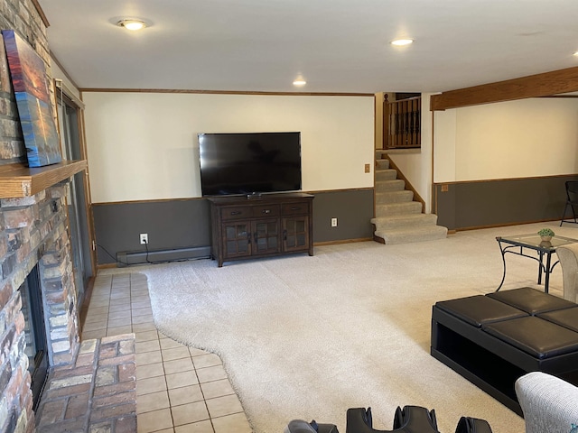 tiled living area with baseboard heating, a brick fireplace, stairway, baseboards, and ornamental molding