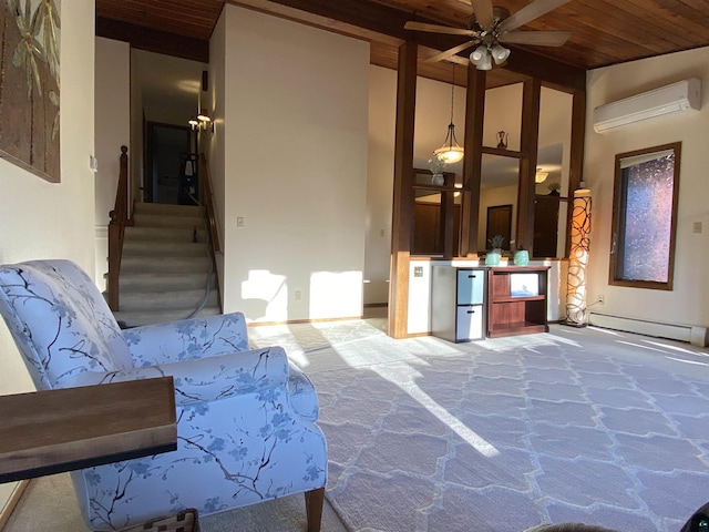 unfurnished living room featuring a ceiling fan, baseboard heating, a wall mounted AC, wooden ceiling, and carpet flooring