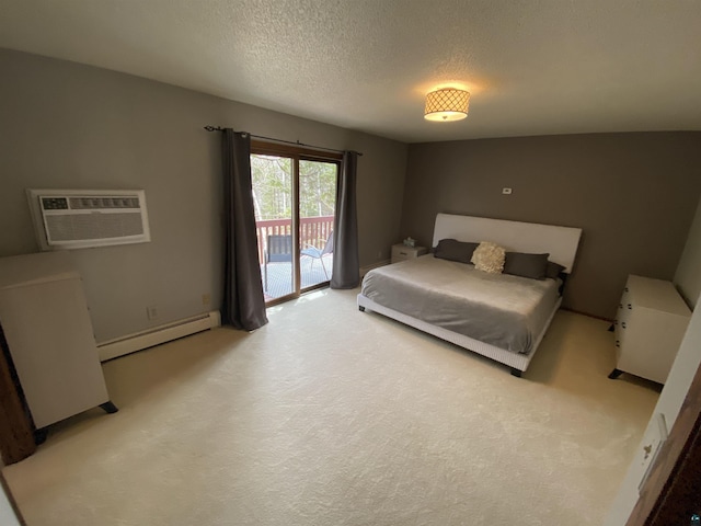 bedroom with a textured ceiling, a baseboard heating unit, an AC wall unit, access to outside, and carpet flooring