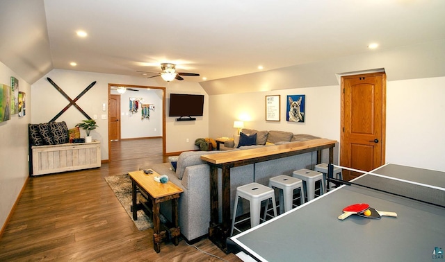 recreation room with ceiling fan, dark wood-style flooring, vaulted ceiling, baseboards, and recessed lighting