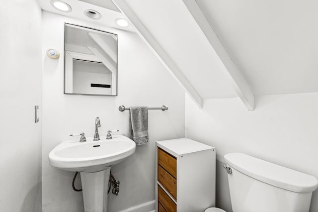 bathroom featuring a sink and toilet