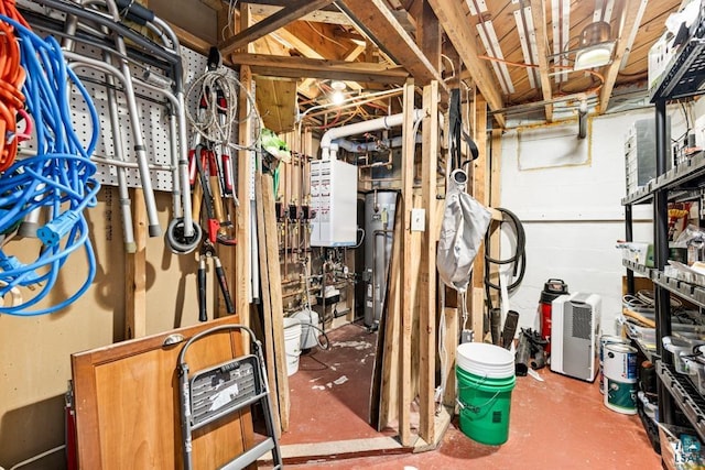 unfinished below grade area featuring water heater