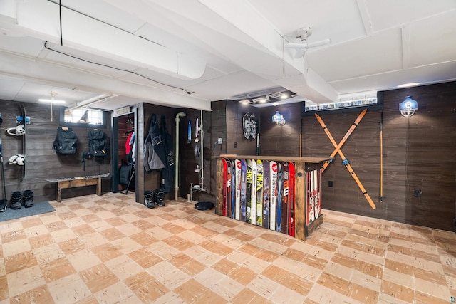 below grade area featuring wooden walls