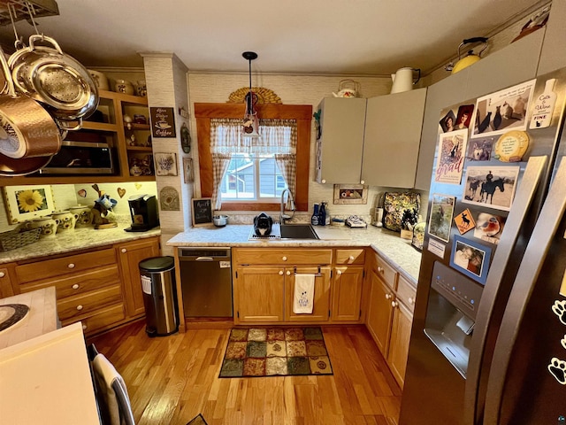 22 Hays Crk, Silver Bay, MN 55614 - kitchen featuring open shelves, appliances with stainless steel finishes, a sink, light wood finished floors, and light countertops