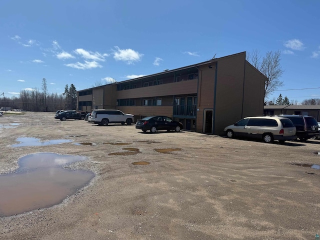 view of uncovered parking lot