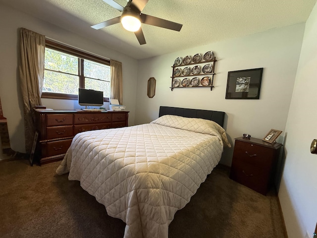 46040 State Highway 65, Nashwauk, MN 55769 - bedroom with dark colored carpet, ceiling fan, and a textured ceiling