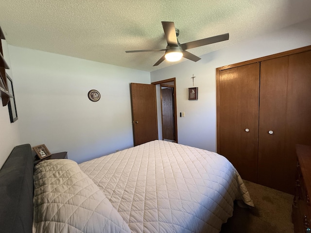 46040 State Highway 65, Nashwauk, MN 55769 - carpeted bedroom with a closet, a textured ceiling, and ceiling fan