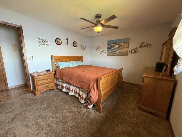 46040 State Highway 65, Nashwauk, MN 55769 - bedroom featuring baseboards, ceiling fan, and carpet
