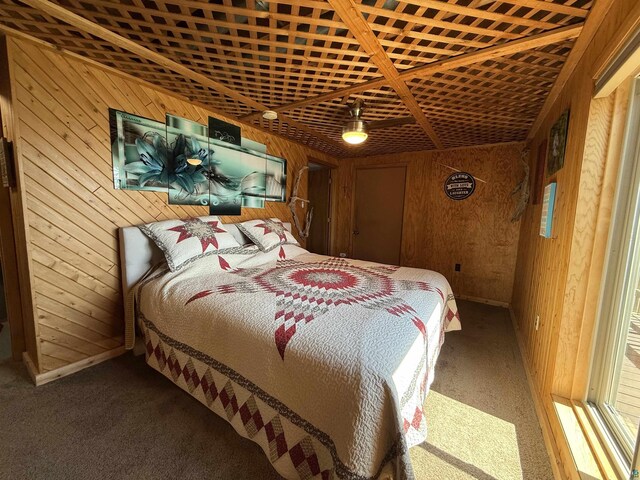 46040 State Highway 65, Nashwauk, MN 55769 - bedroom featuring carpet flooring and wood walls