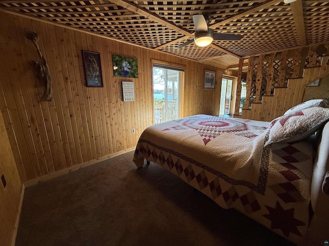 46040 State Highway 65, Nashwauk, MN 55769 - bedroom featuring wood walls, baseboards, and access to exterior
