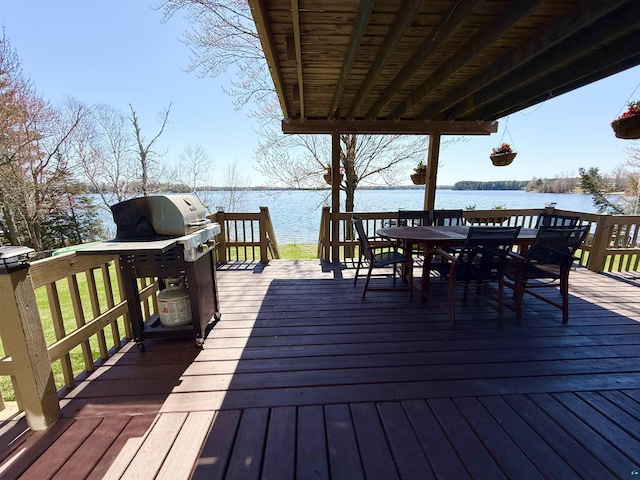 46040 State Highway 65, Nashwauk, MN 55769 - wooden terrace with a water view and outdoor dining space
