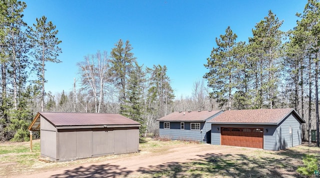 exterior space with dirt driveway