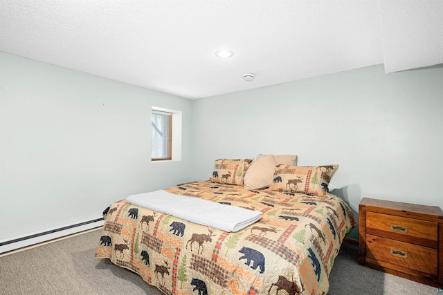 carpeted bedroom with a baseboard heating unit