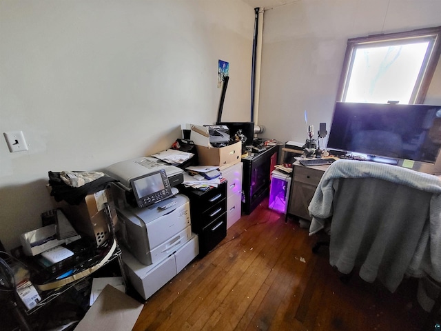 office space with wood-type flooring
