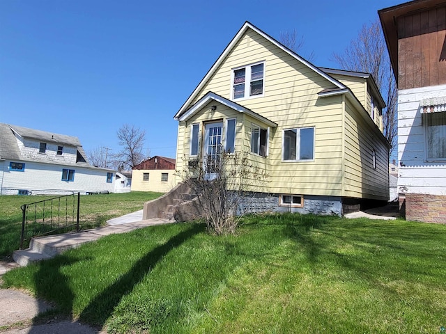 bungalow with a front lawn