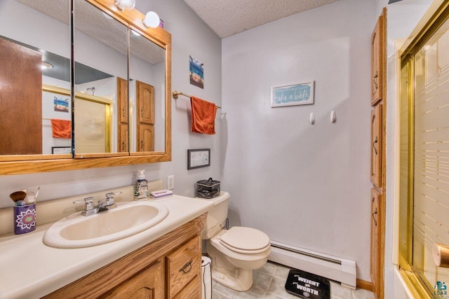 bathroom featuring a textured ceiling, a baseboard heating unit, toilet, tile patterned flooring, and vanity