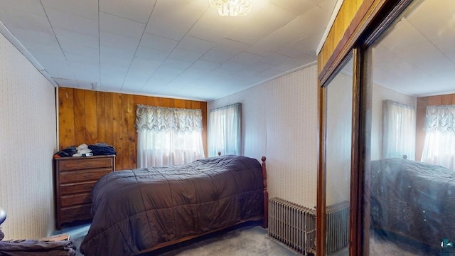 15 W 8th Ave, Grand Marais, MN 55604 - carpeted bedroom with radiator and wallpapered walls
