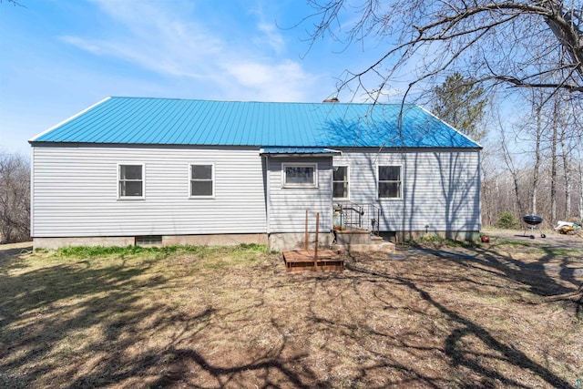 5463 Maple Hill Rd, Proctor, MN 55810 - back of house with metal roof and a lawn