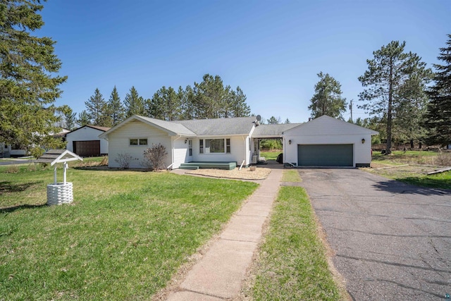 1741 Olsonville Crk, Carlton, MN 55718 - ranch-style home with a garage, driveway, and a front yard