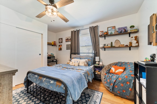 1741 Olsonville Crk, Carlton, MN 55718 - bedroom with wood finished floors, a ceiling fan, and a closet