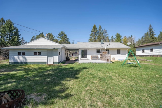 1741 Olsonville Crk, Carlton, MN 55718 - back of house featuring a patio and a yard