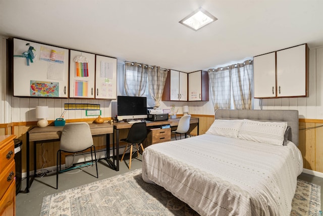 1741 Olsonville Crk, Carlton, MN 55718 - bedroom featuring concrete flooring and wood walls