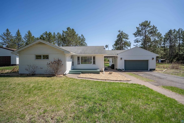 1741 Olsonville Crk, Carlton, MN 55718 - ranch-style house with a garage, driveway, and a front yard