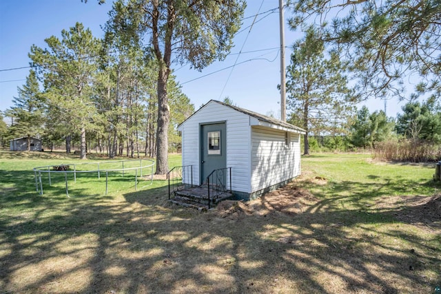 1741 Olsonville Crk, Carlton, MN 55718 - view of outbuilding featuring a trampoline and an outdoor structure