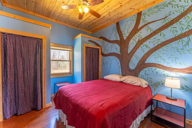 118 Sunset Rd, Ely, MN 55731 - bedroom with crown molding, wood finished floors, wooden ceiling, ceiling fan, and baseboards