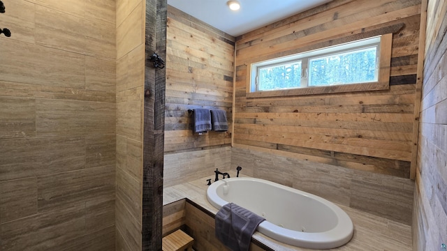7498 Bayside Dr, Crane Lake, MN 55725 - full bath with a tub with jets and wooden walls