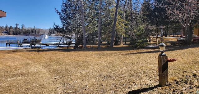 5729 Puncher Point Rd, Tower, MN 55790 - view of green lawn featuring view of wooded area