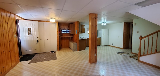 5729 Puncher Point Rd, Tower, MN 55790 - foyer with stairs, a drop ceiling, wood walls, and carpet floors