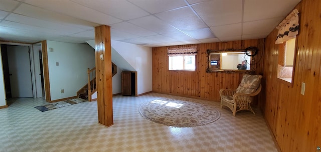 5729 Puncher Point Rd, Tower, MN 55790 - entryway with wood walls, stairway, and a paneled ceiling