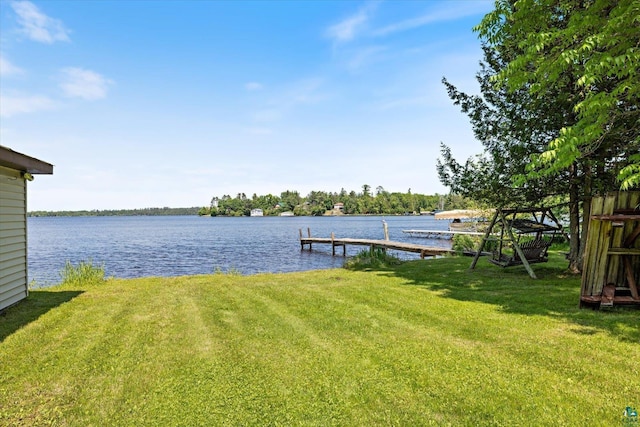 5729 Puncher Point Rd, Tower, MN 55790 - dock area featuring a lawn and a water view