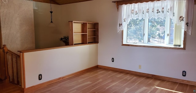 5729 Puncher Point Rd, Tower, MN 55790 - unfurnished room featuring wood finished floors and baseboards