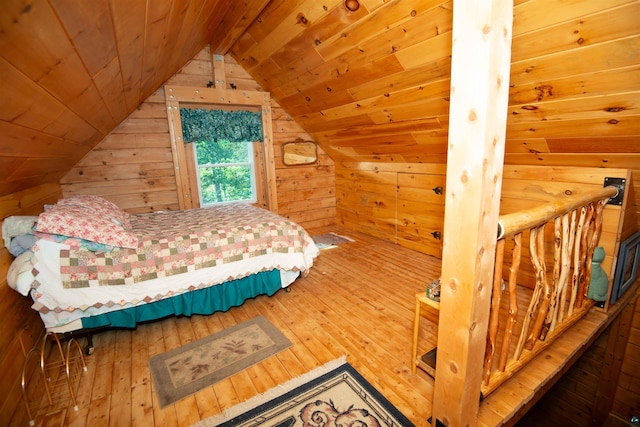 1808 Tom Lake Rd, Hovland, MN 55606 - bedroom with hardwood / wood-style flooring, wooden walls, wooden ceiling, and vaulted ceiling