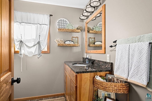 7070 Rice Lake Rd, Duluth, MN 55803 - bathroom featuring vanity and baseboards