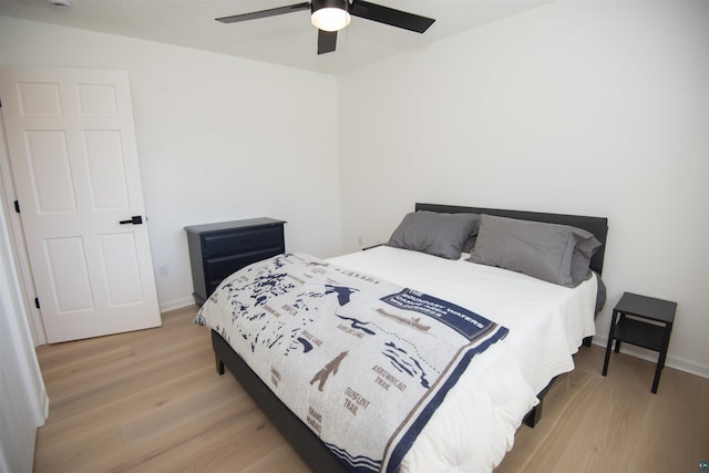500 W 5th St, Grand Marais, MN 55604 - bedroom featuring light wood-style floors, a ceiling fan, and baseboards