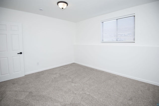 500 W 5th St, Grand Marais, MN 55604 - spare room featuring carpet, baseboards, and a smoke detector