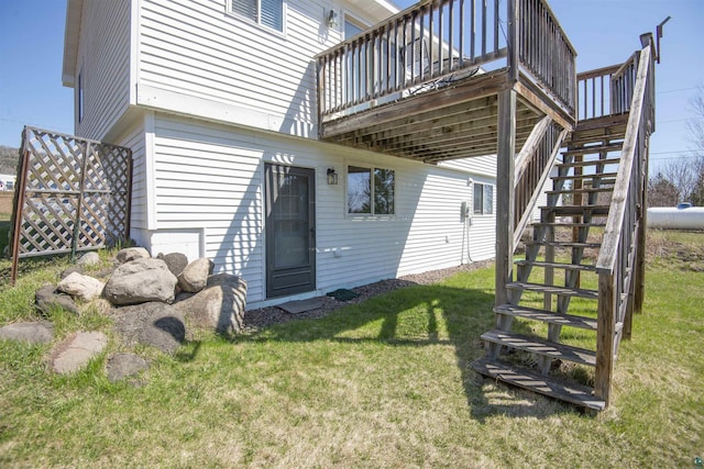 500 W 5th St, Grand Marais, MN 55604 - rear view of house with stairway, a yard, and a deck