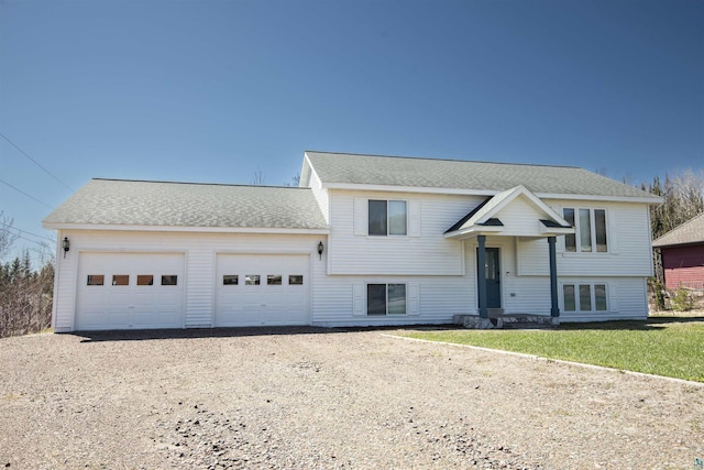500 W 5th St, Grand Marais, MN 55604 - split foyer home featuring driveway and a garage