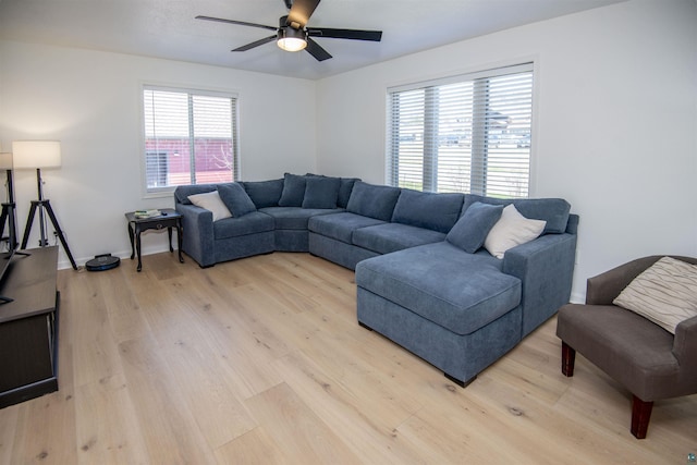 500 W 5th St, Grand Marais, MN 55604 - living room with ceiling fan and light wood-style floors