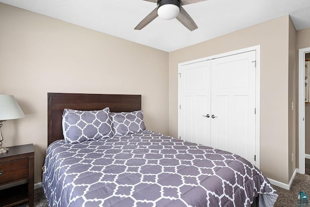 bedroom with carpet, baseboards, a closet, and a ceiling fan