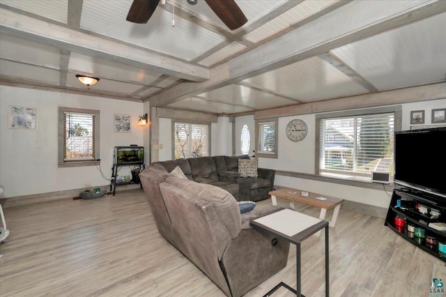 121 11th St, Cloquet, MN 55720 - living area featuring light wood-style flooring, beam ceiling, ceiling fan, and baseboards