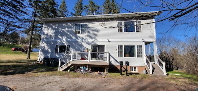 908 E Skyline Pkwy, Duluth, MN 55805 - back of property with stairway and a deck