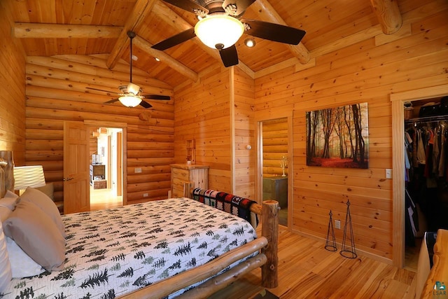 3165 Randa Rd, Cook, MN 55771 - bedroom with wooden ceiling, wood finished floors, beamed ceiling, log walls, and a closet