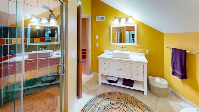 879 Clearwater Rd, Grand Marais, MN 55604 - bathroom featuring a stall shower, vanity, vaulted ceiling, tile patterned floors, and baseboards