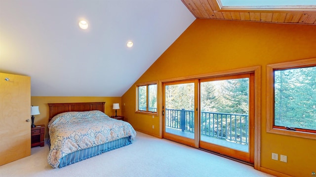 879 Clearwater Rd, Grand Marais, MN 55604 - carpeted bedroom featuring access to exterior and lofted ceiling