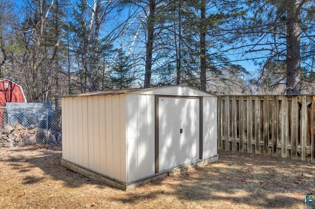 726 Laurel St, Cloquet, MN 55720 - view of shed featuring fence